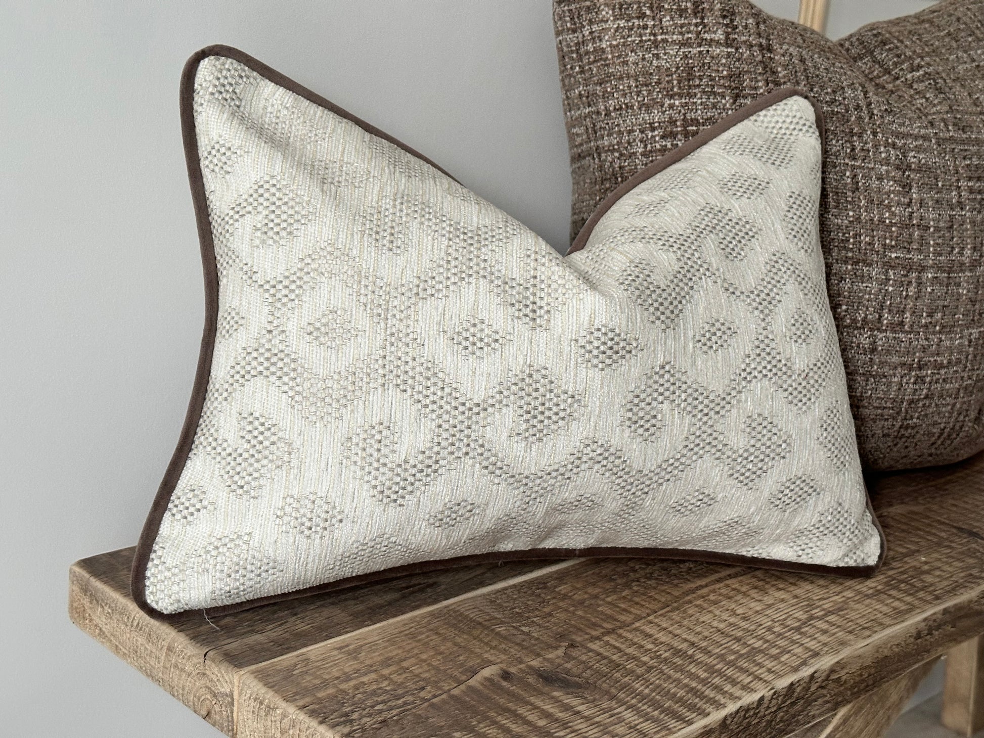 Luxury rectangle cushion In Ivory with pattern. 