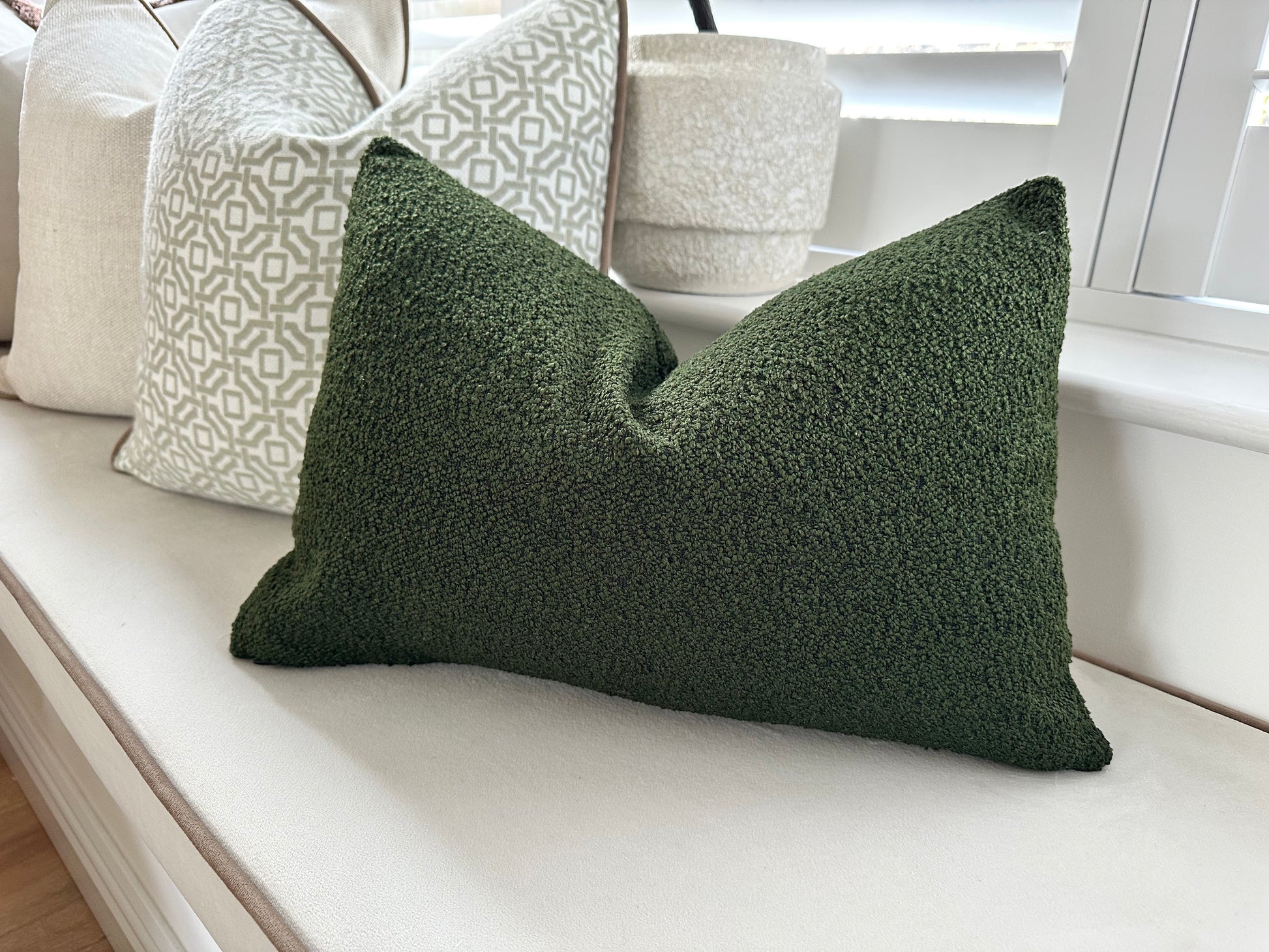 Green boucle rectangle cushion.