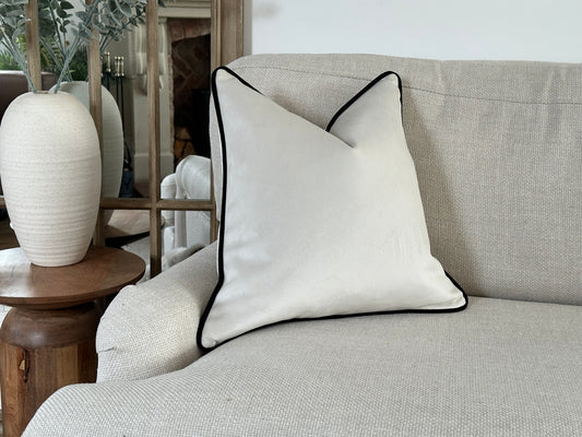 Luxury Ivory off white velvet cushion with black piping trims. Available in all sizes and customisable edge.