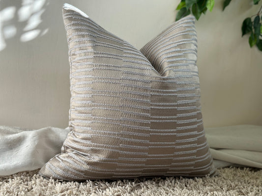 textured silver pillow 