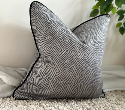 Luxury grey pillow with black edge