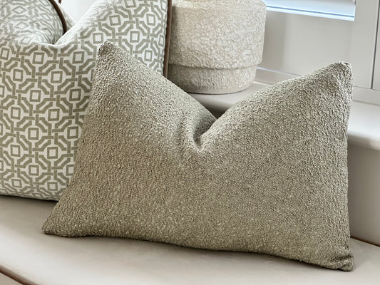 Sage Green boucle lumbar cushion.