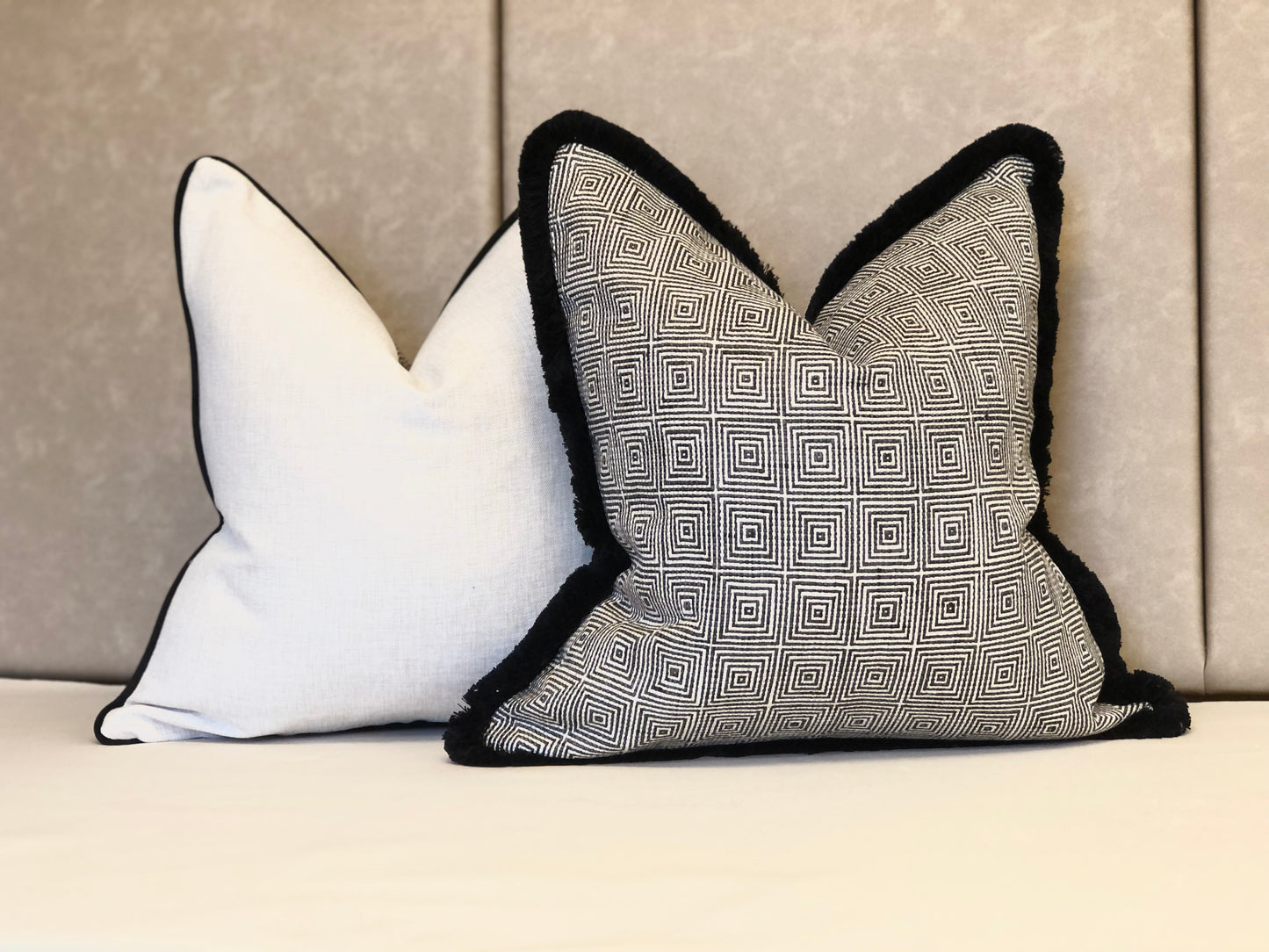 Lucky black and white modern fringed cushion