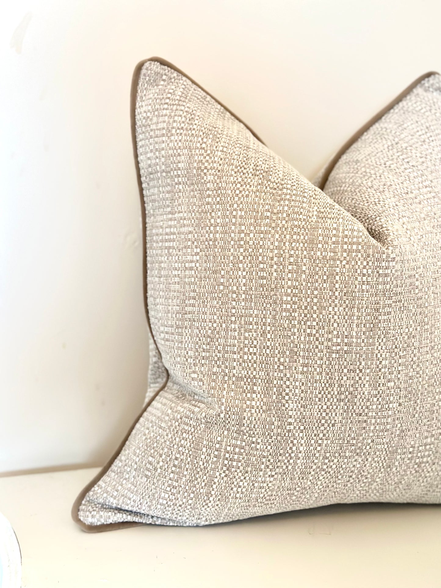 Luxury pillows, textured cream beige cushion with piped edge