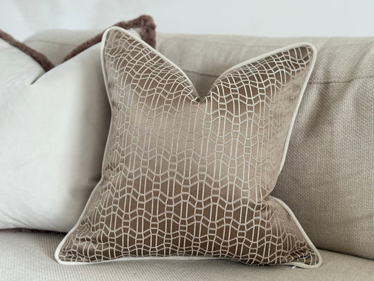 Luxury beige taupe silk feel cushion with ivory piping.