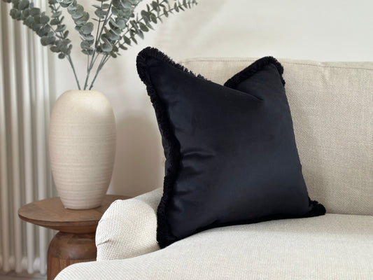 Fringed Plain black cushion 