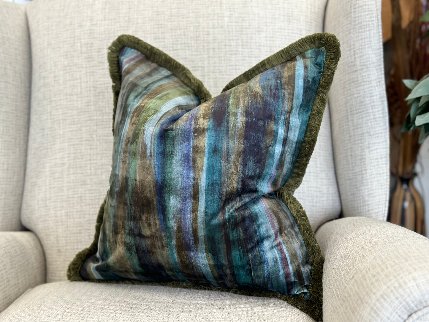 Luxury blue and green printed velvet fringe cushion for sofa or bed. Living room decor