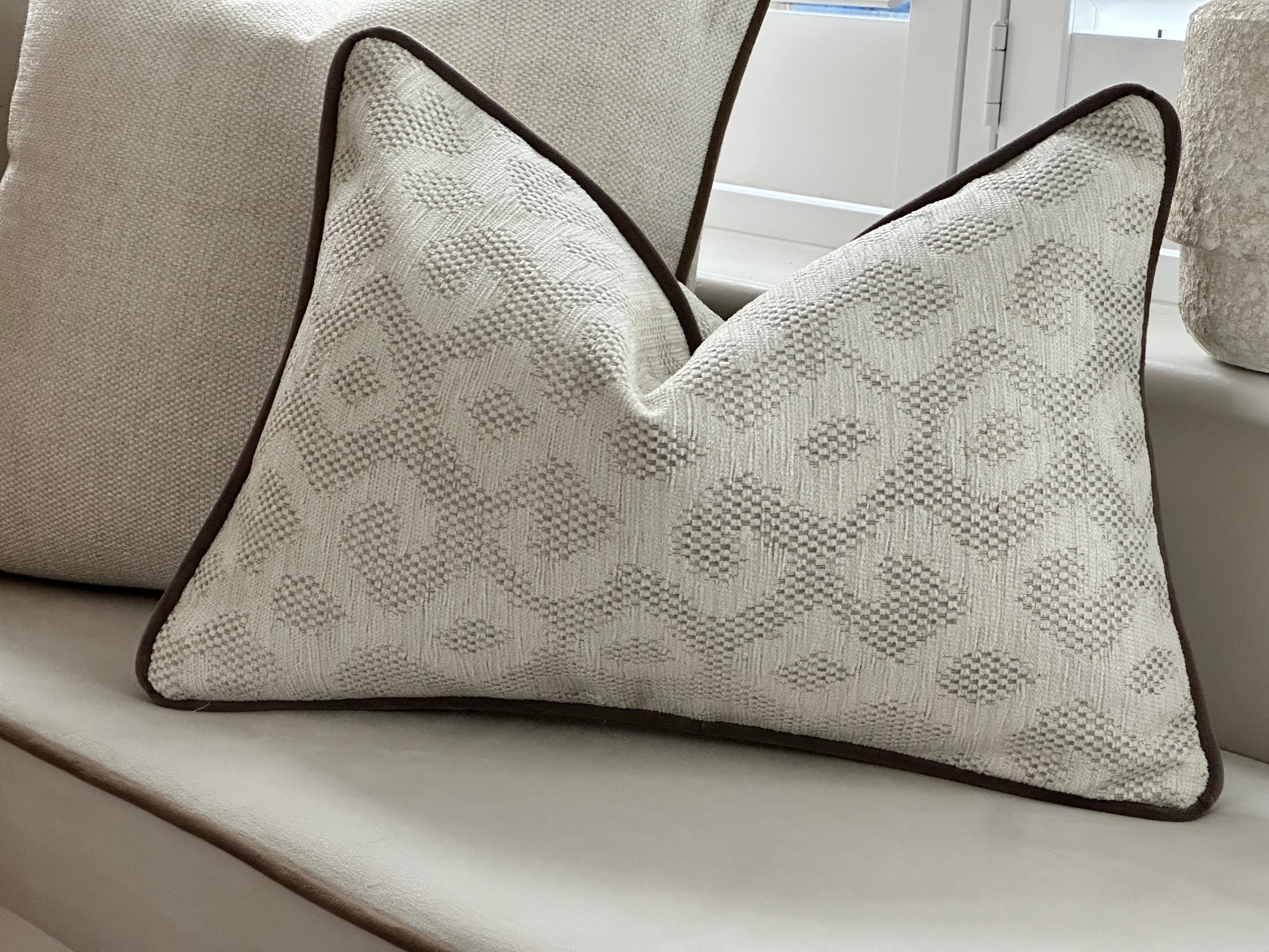 Ivory patterned lumbar pillow 