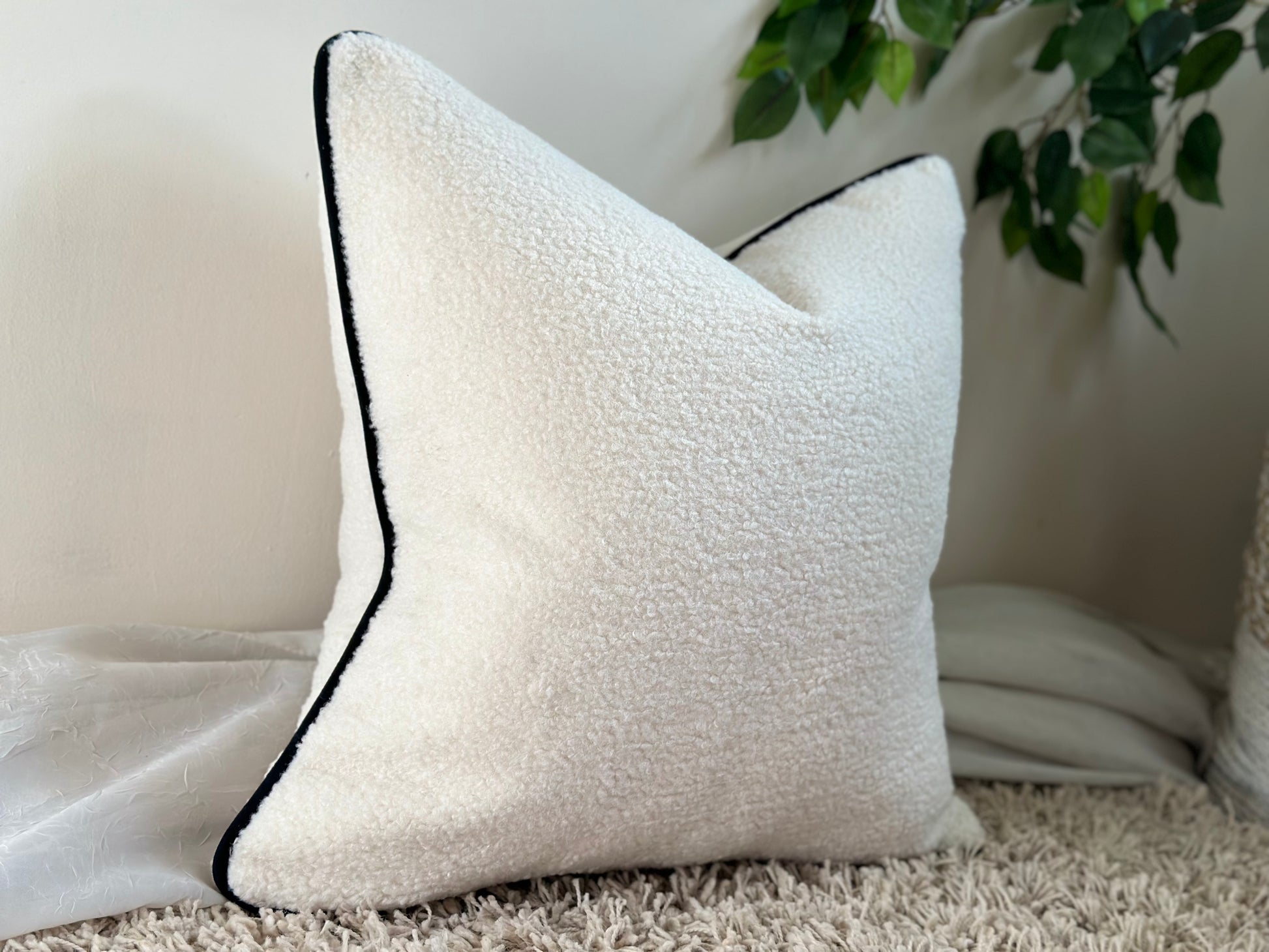 Molly mae style cushion, ivory cream faux sheep’s fur pillow with black piping trim