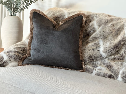 Black fringed Cushion features a textured look making it an ideal accent for sofas, beds, and reading nooks.