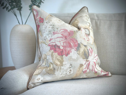 A beautiful delicate floral cushion in neutral tones. Country abode decor