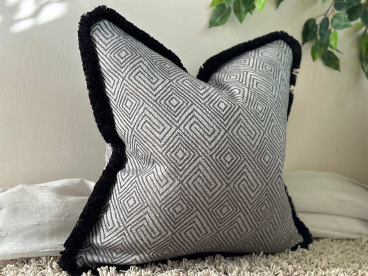 grey Geometric pillow with fringe