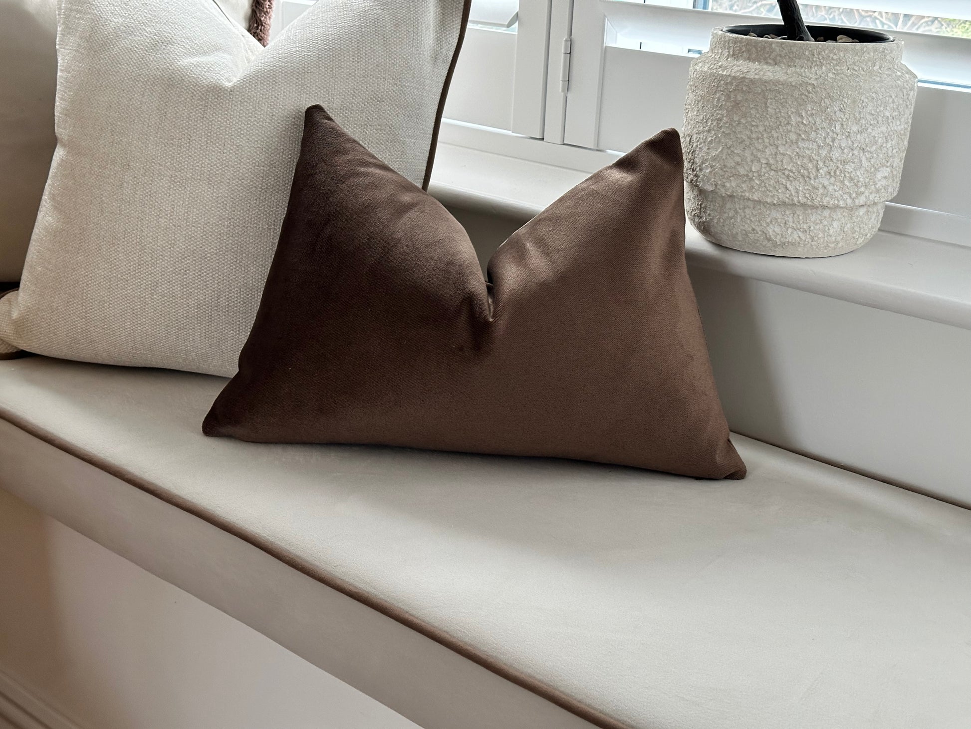 Brown lumbar pillow