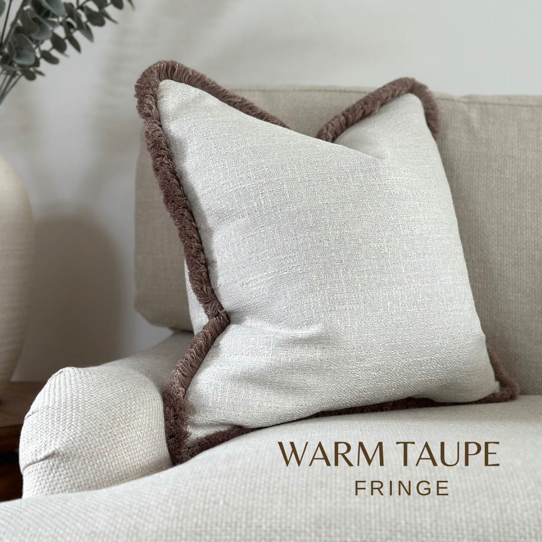 Textured ivory fringe pillow. Neutral decor