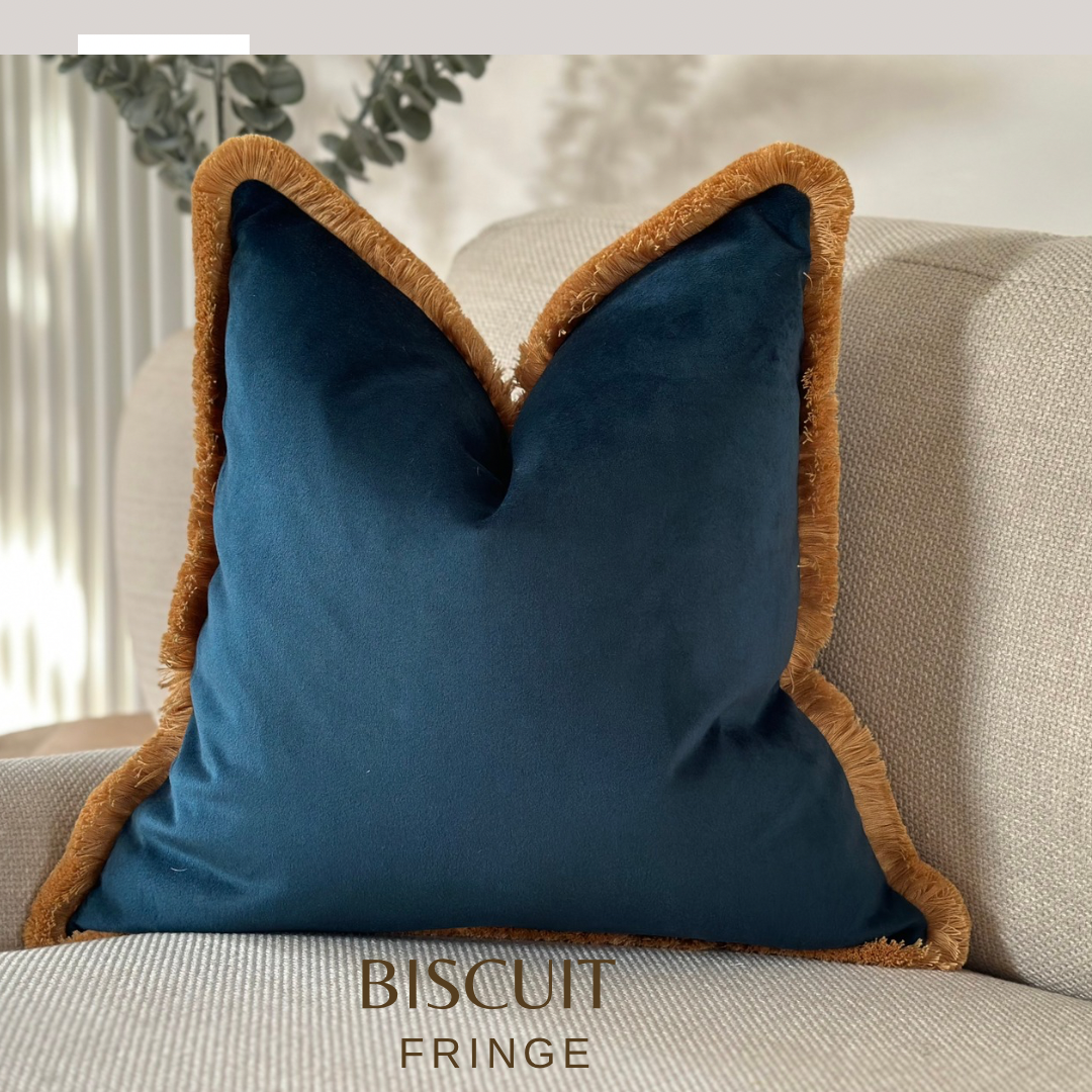 Navy velvet fringed cushion