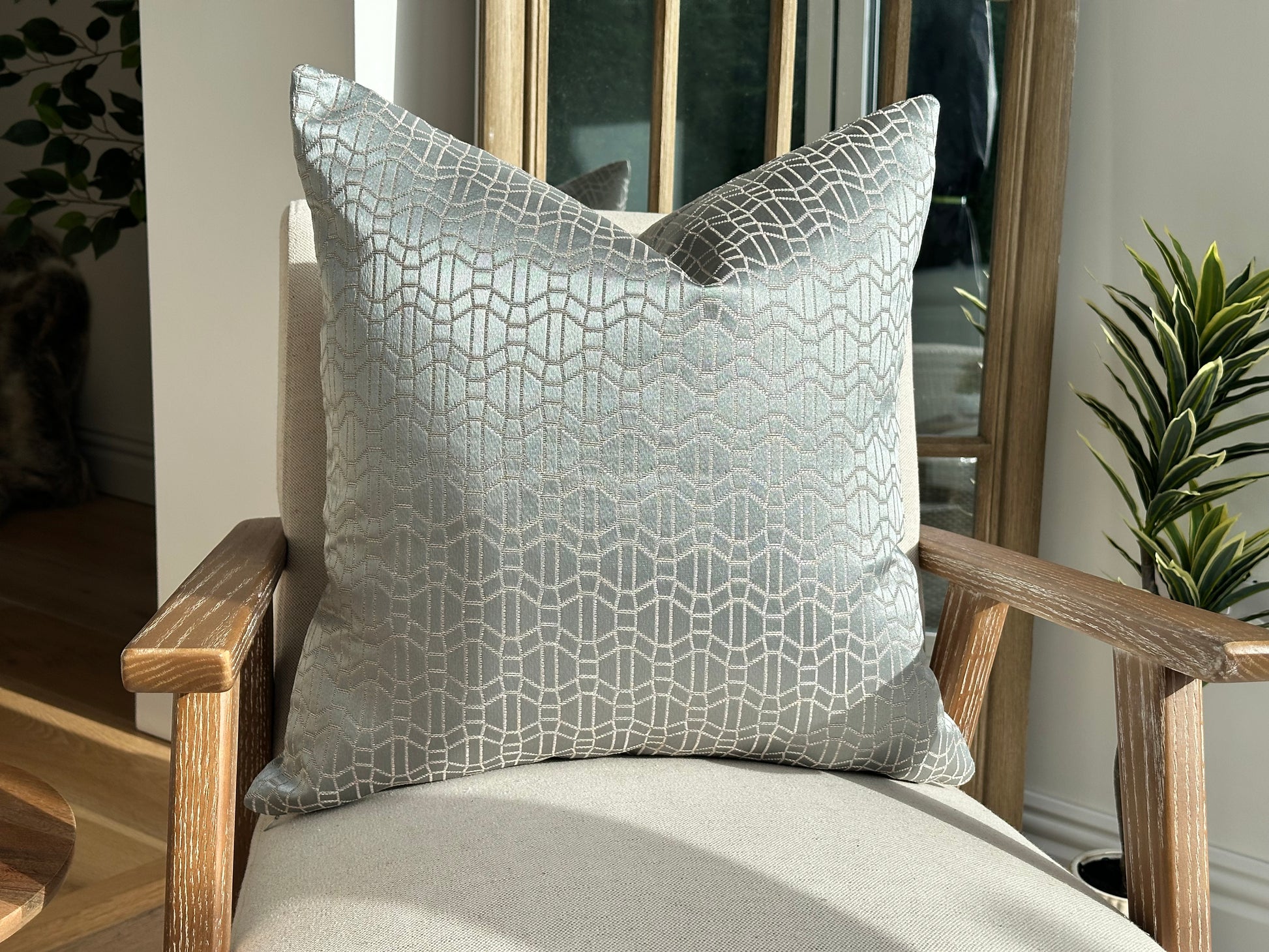 Silver geometric pillow