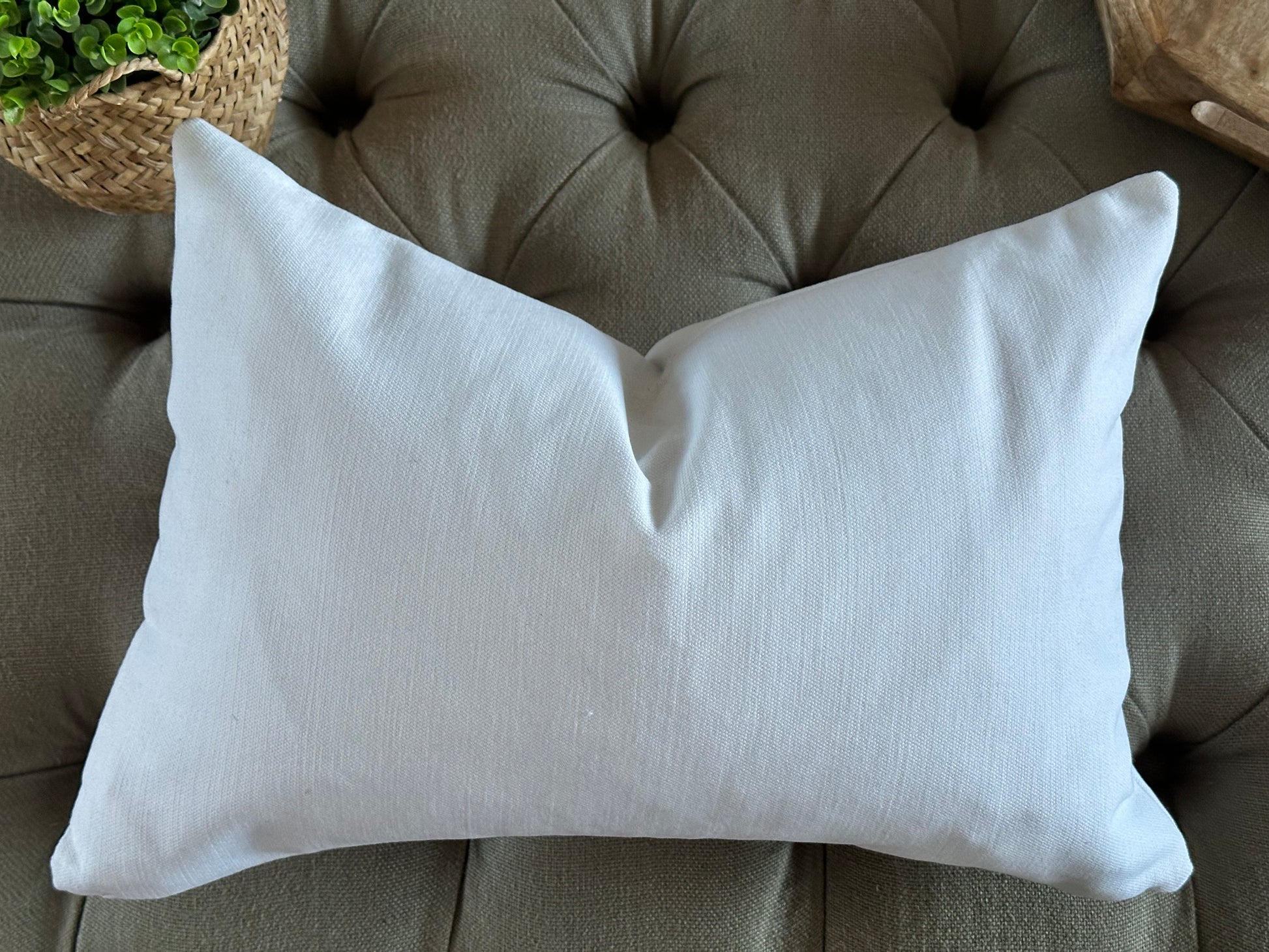 White cotton lumbar pillow