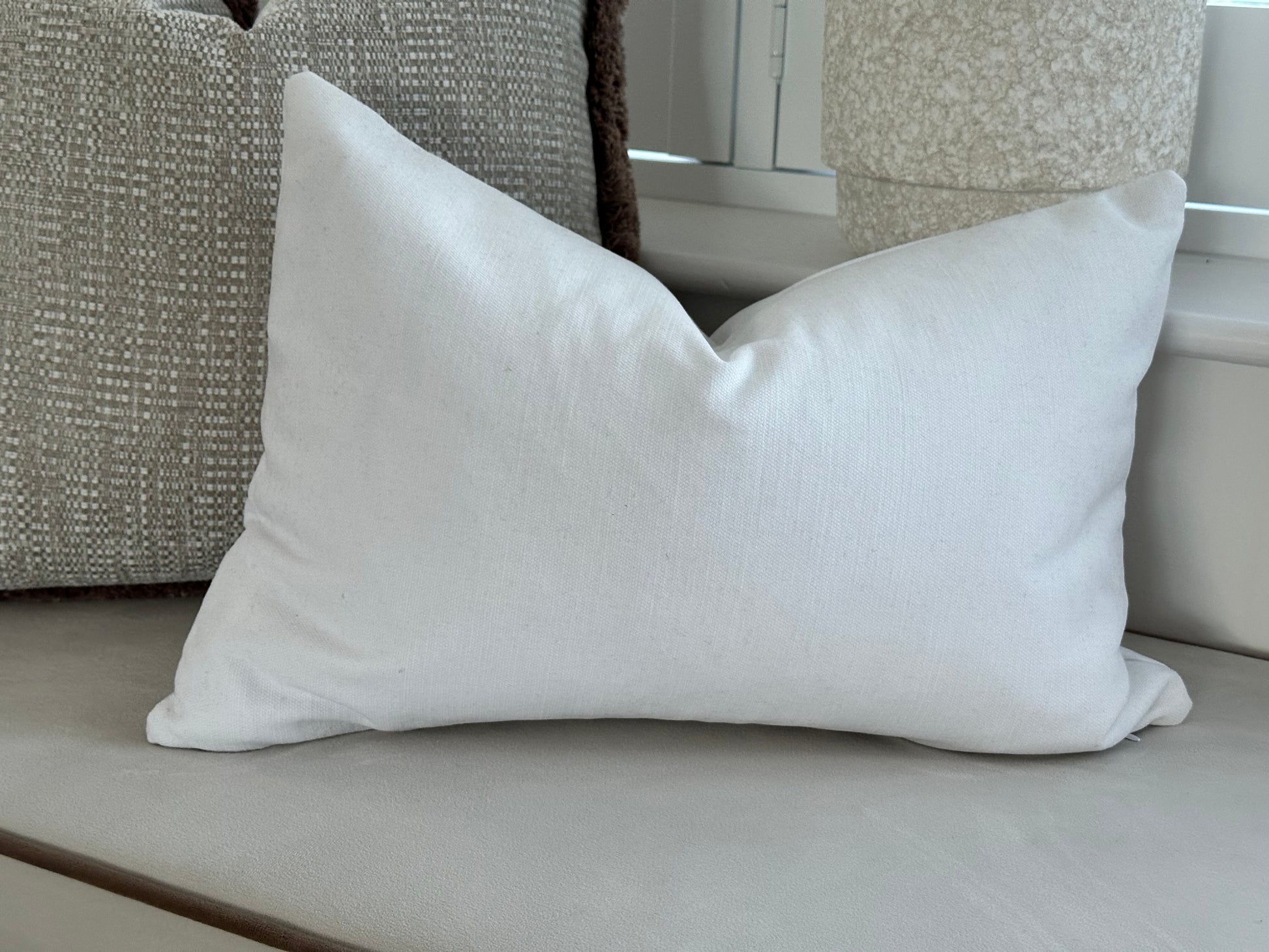 White cotton rectangle cushion