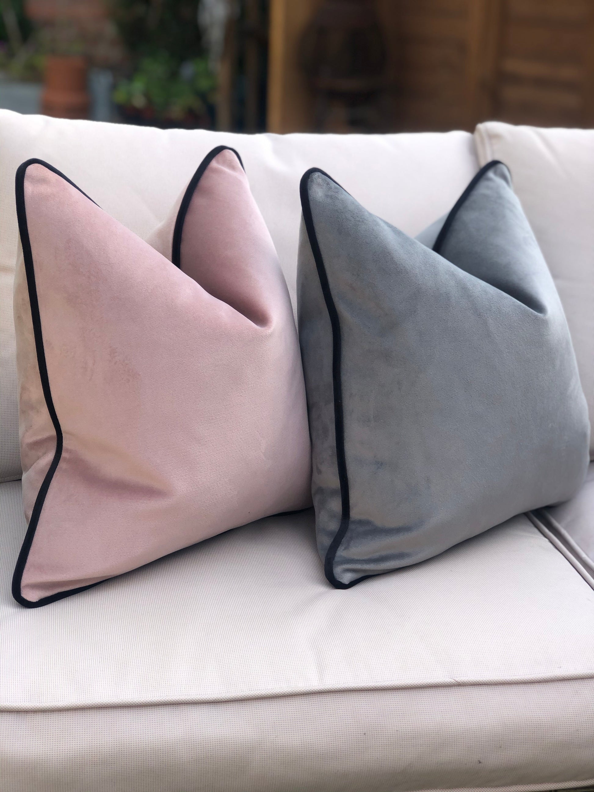 pink grey and back scatter cushions