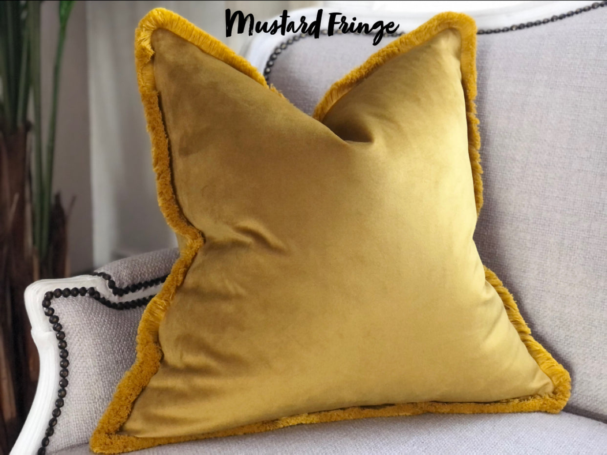 fringed mustard cushion