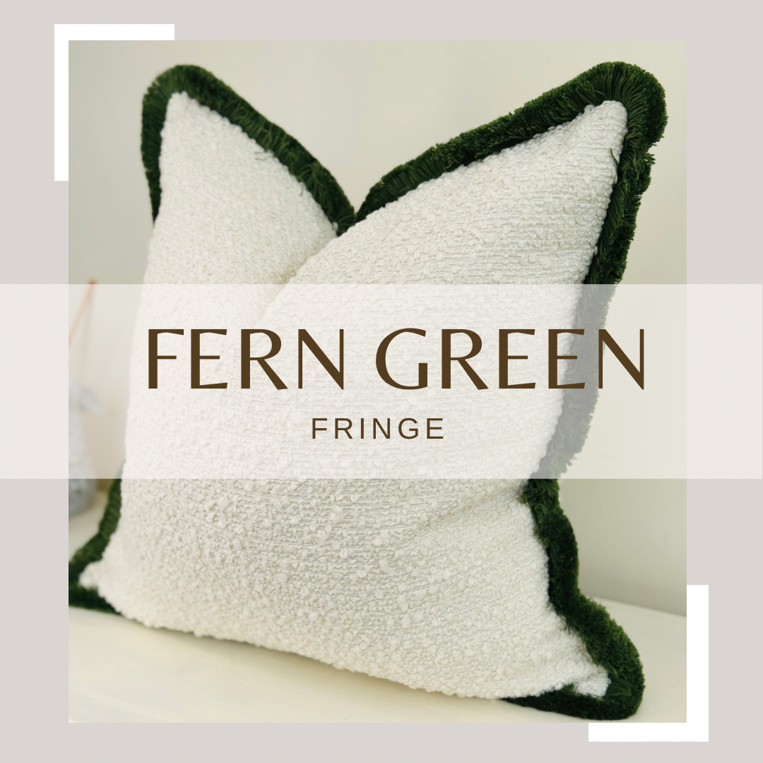 ivory cream textured pillow with green fluffy border