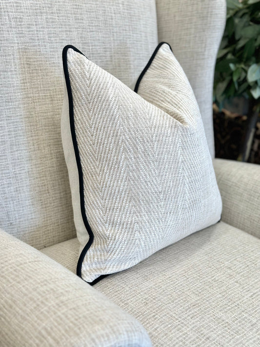 luxury neutral patterned cushion with black trim