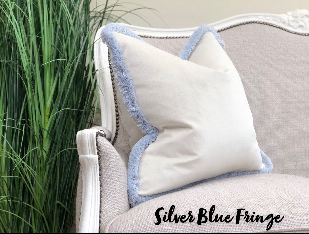 ivory pillow with fringe