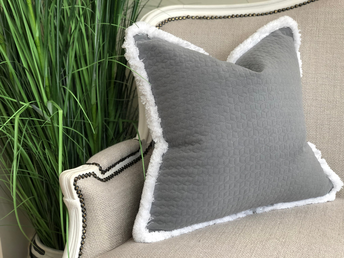 large grey and white cushion 