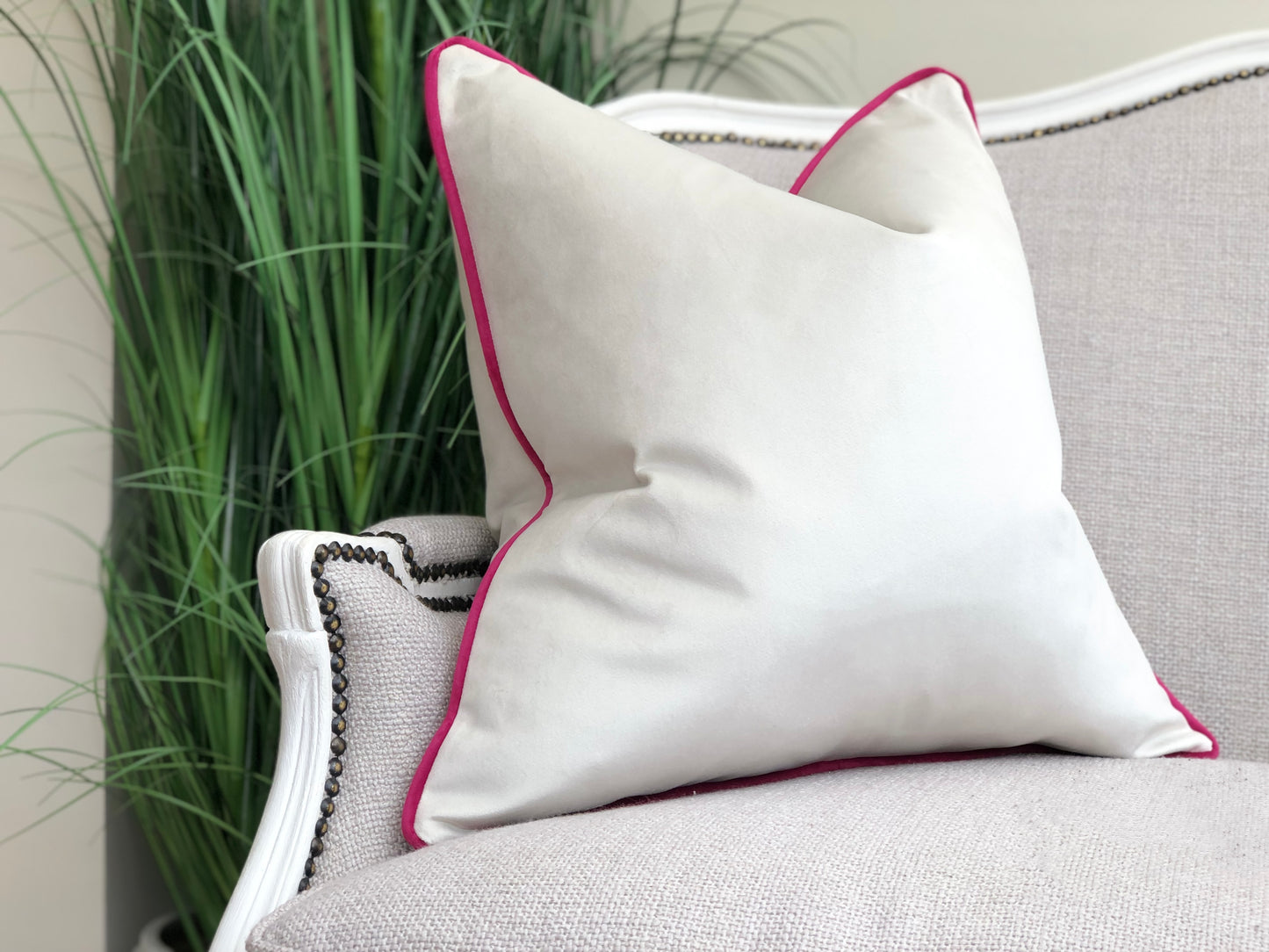 white and pink cushion