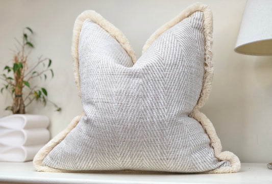 Herringbone cushion with fringe