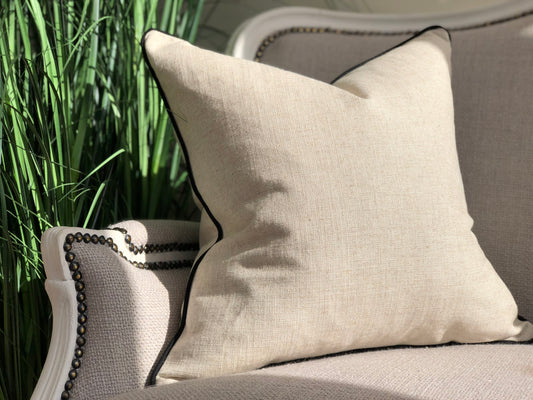 linen cushion with black piping