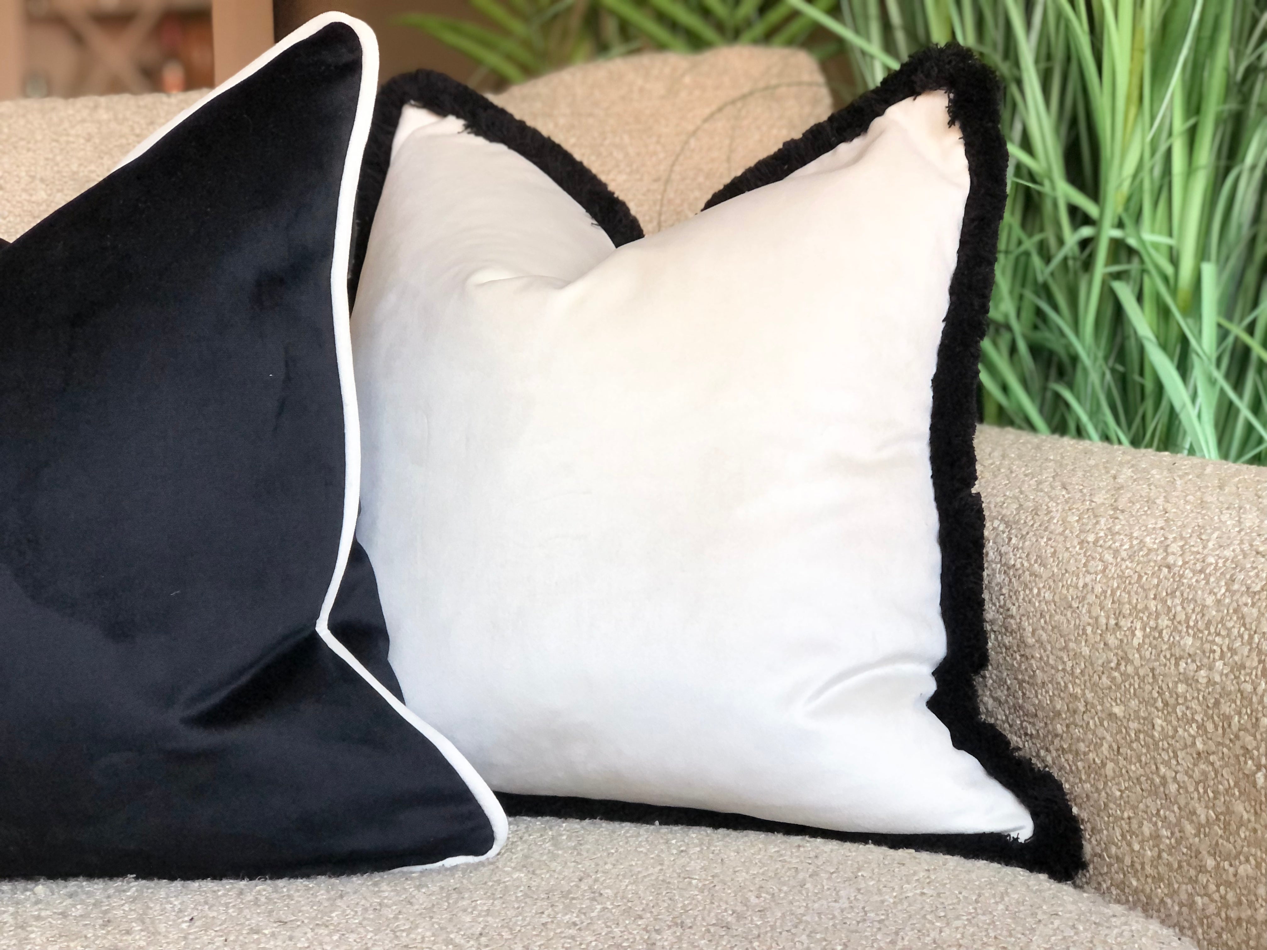 Black and white fringe hot sale pillow