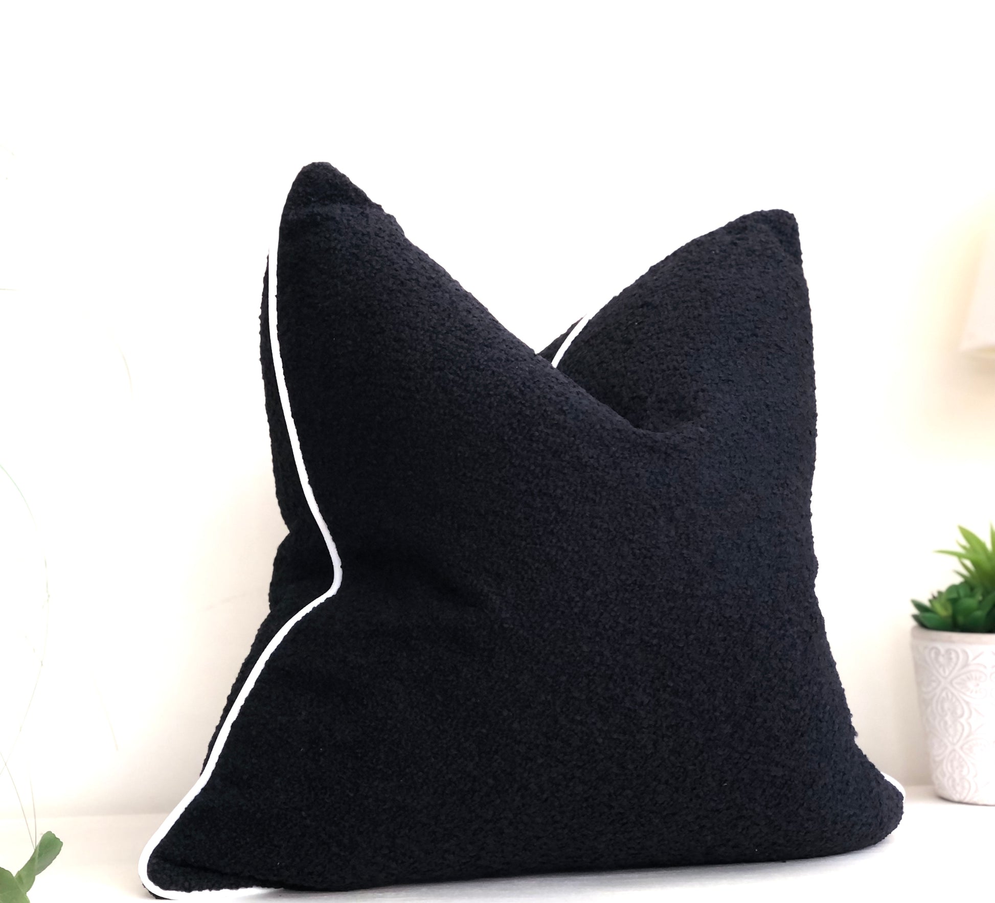 black cushion with white trim