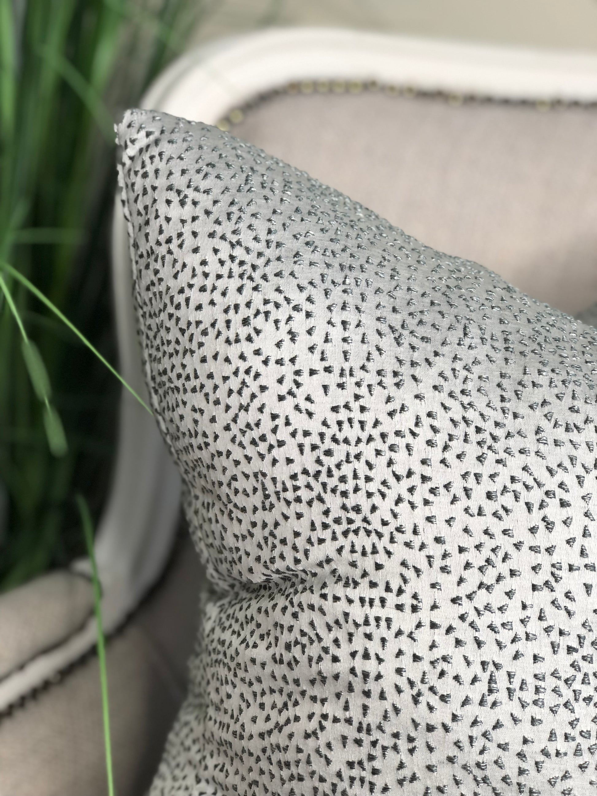 silver patterned pillow