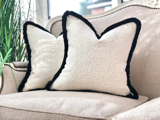 white cushion black edges 