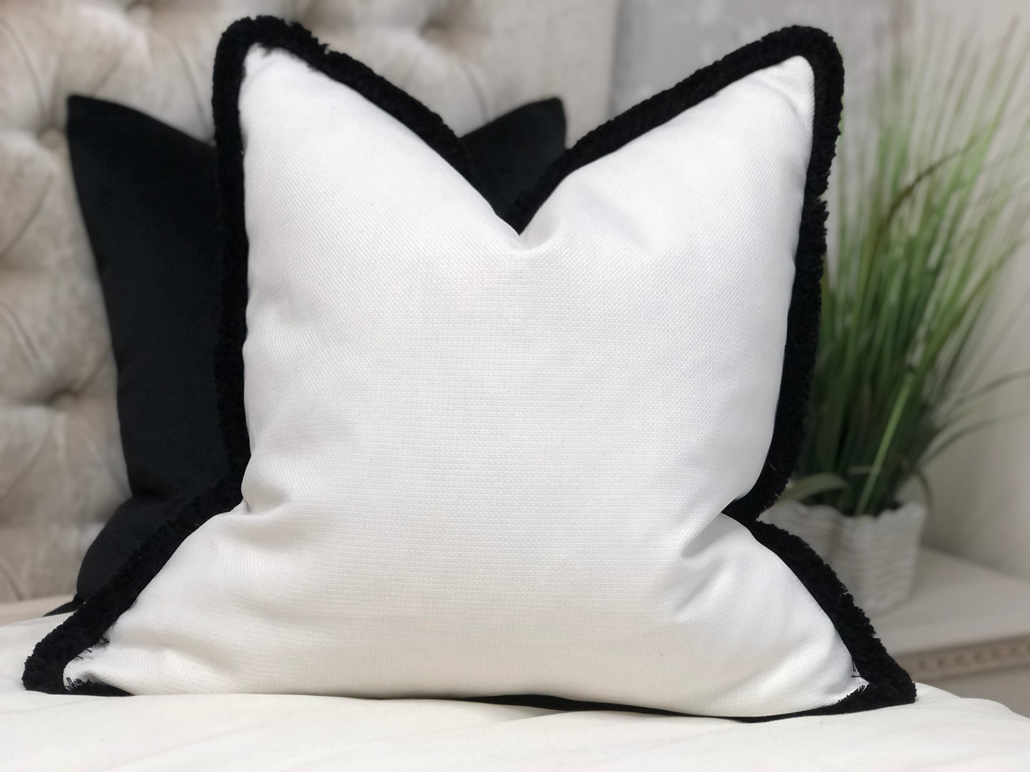 white pillow black trim