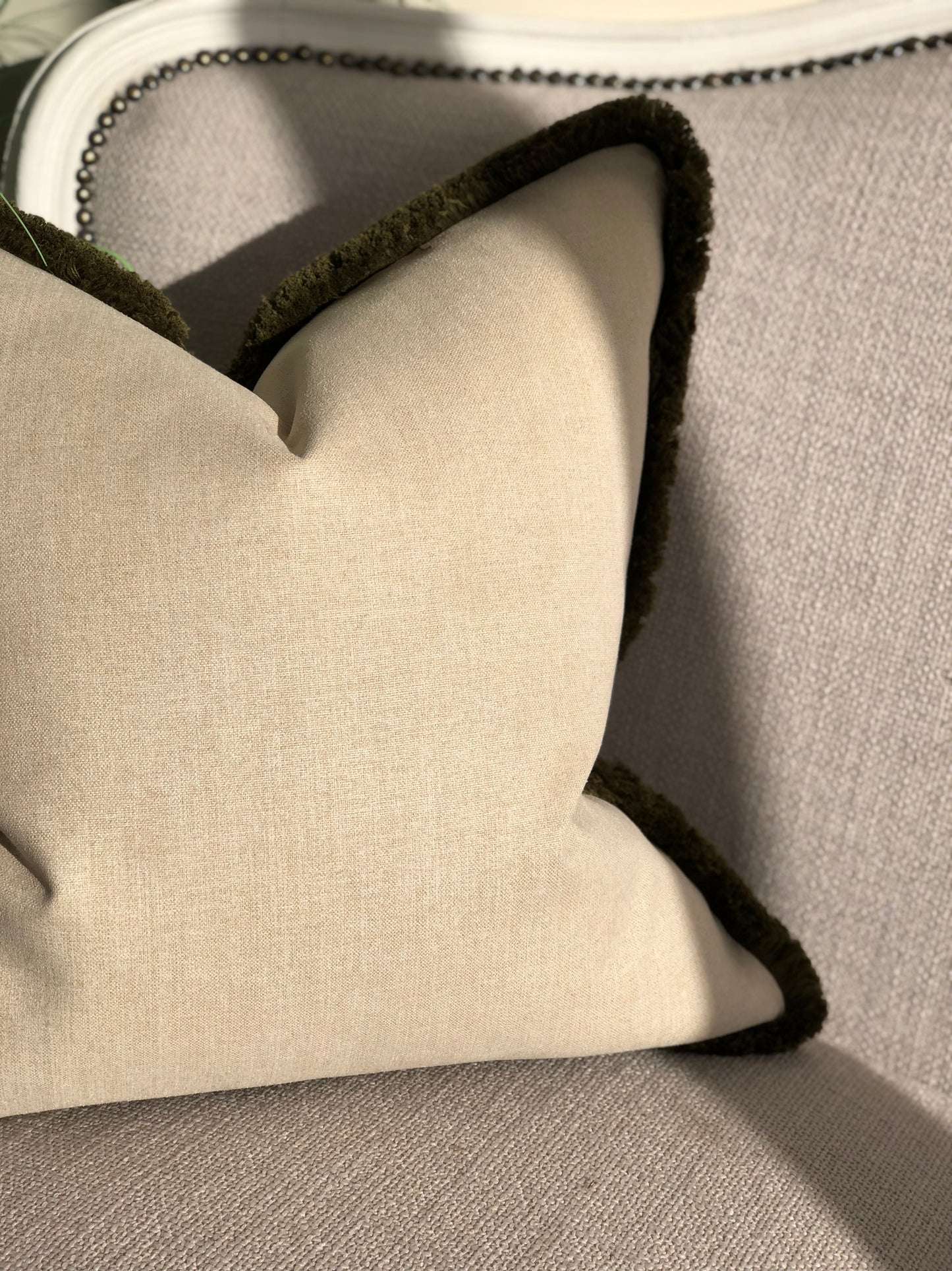 neutral cushion with fringe